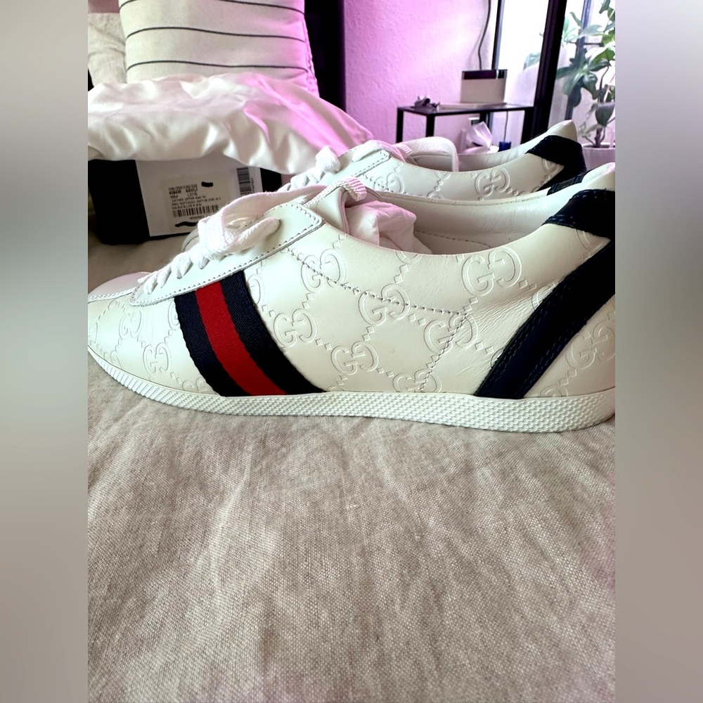 Like new, Gucci sneakers! Worn once and stored in box, in dust covers